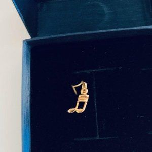 14k gold double musical note charm by Carla